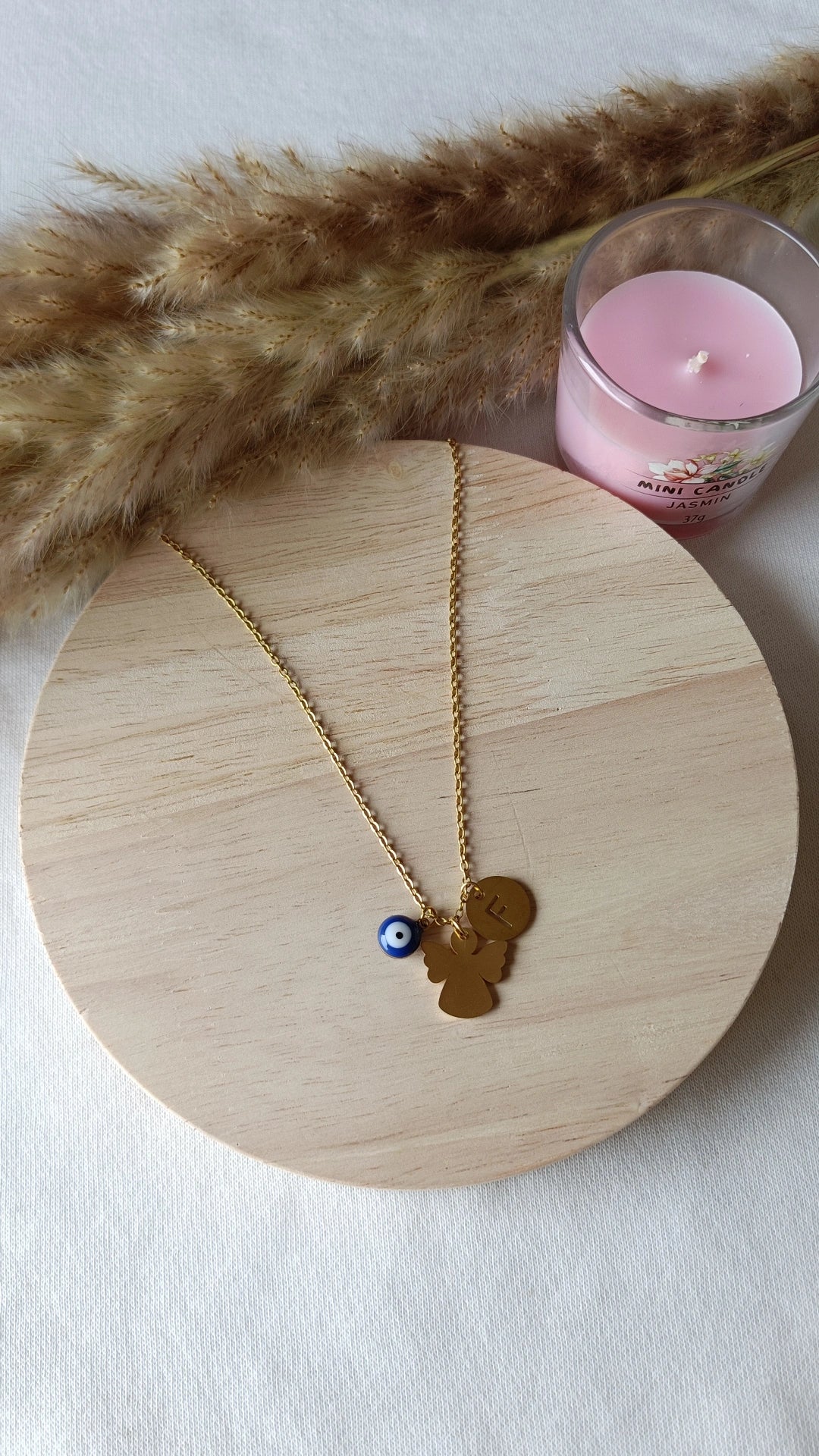 Colar de Aço Dourado de Anjo + Inicial e Olho Turco