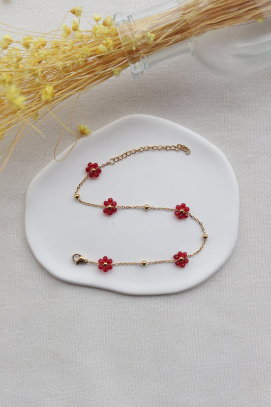Pulseira de Aço Dourado de Pé com Flores Vermelhas de Missangas