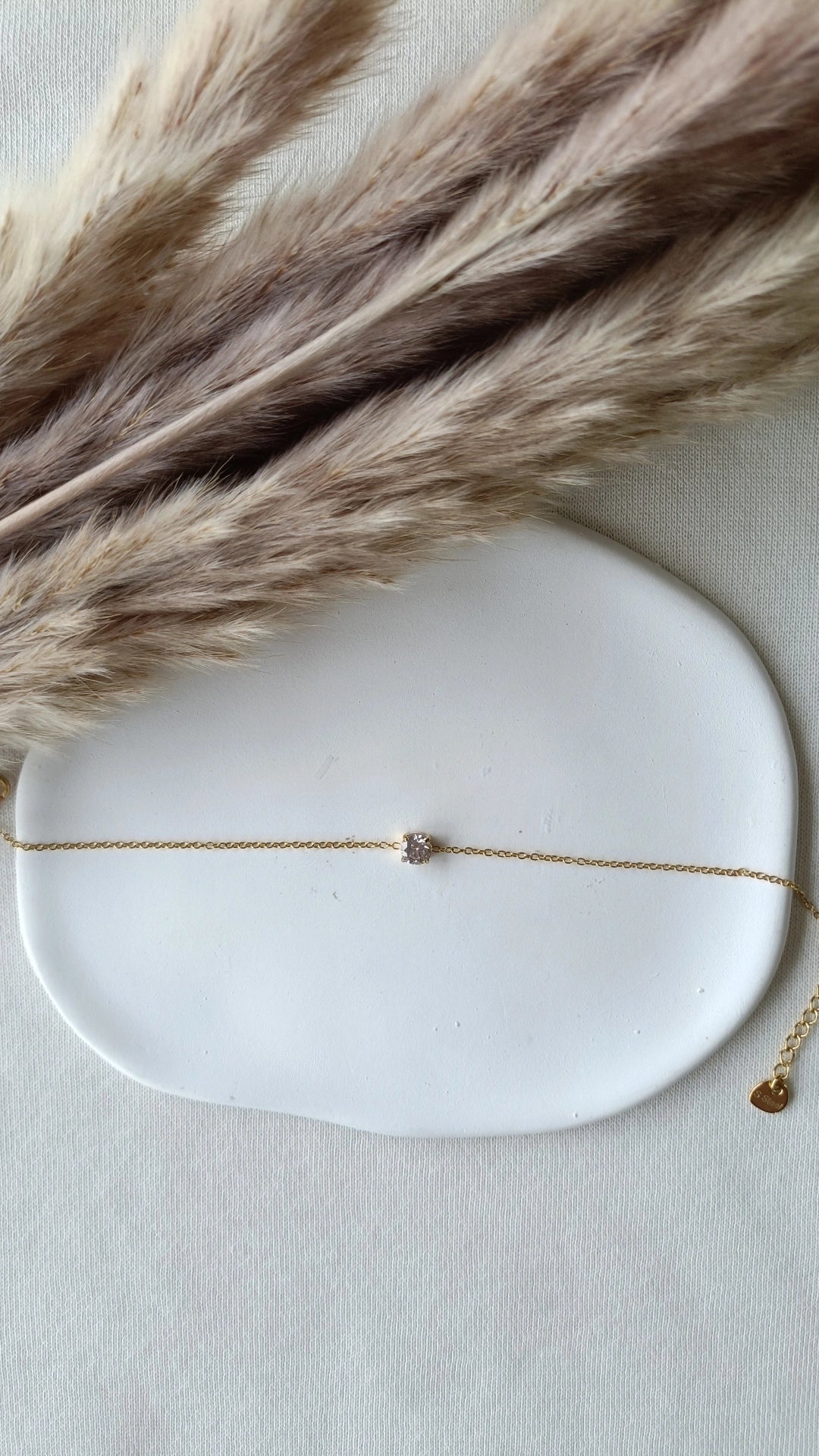 Pulseira de Aço Dourado com Zircônia