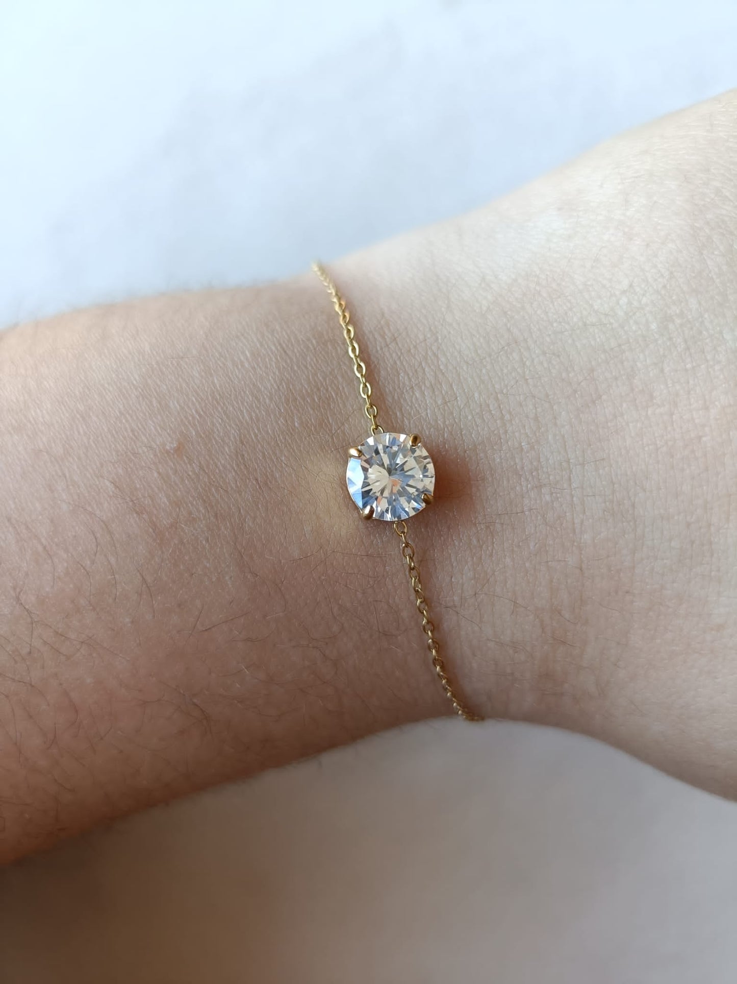 Pulseira de Aço Dourado com Zircónica Branca