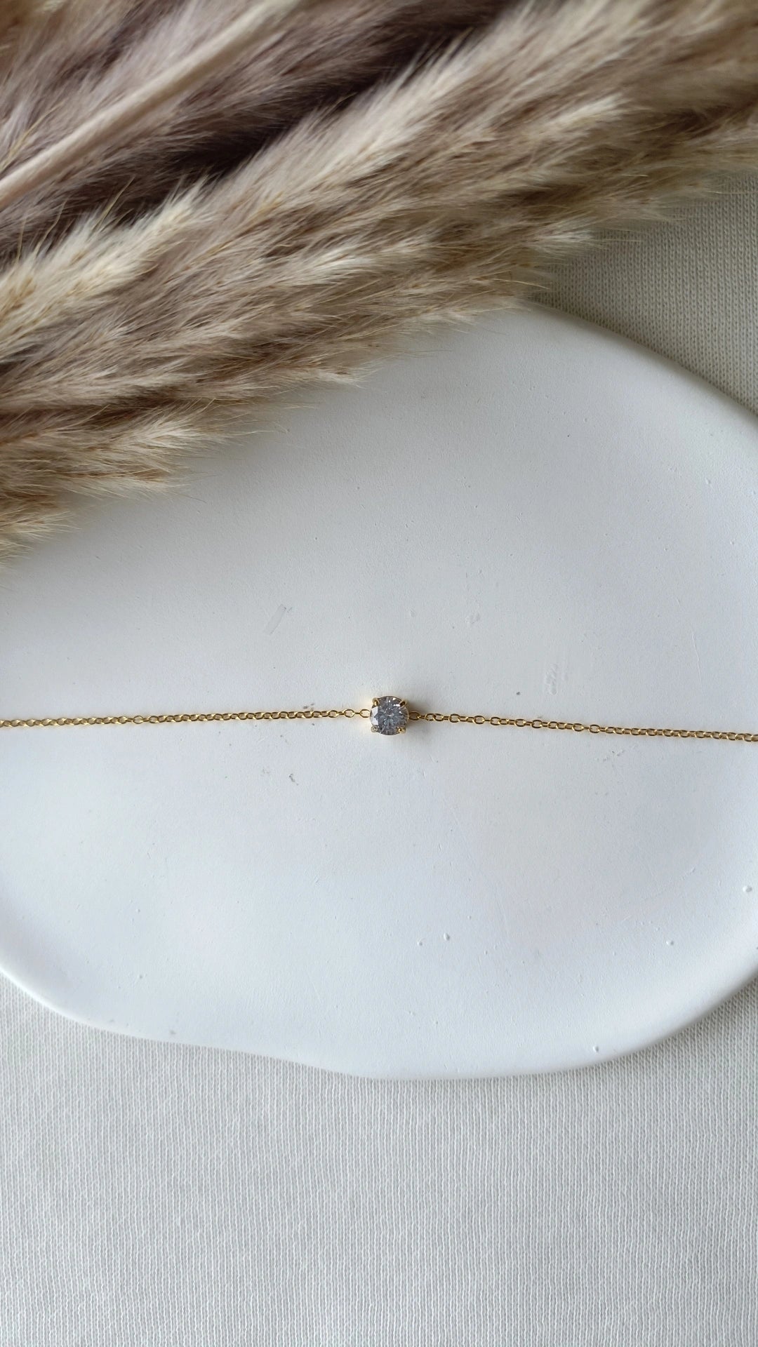 Pulseira de Aço Dourado com Zircônia
