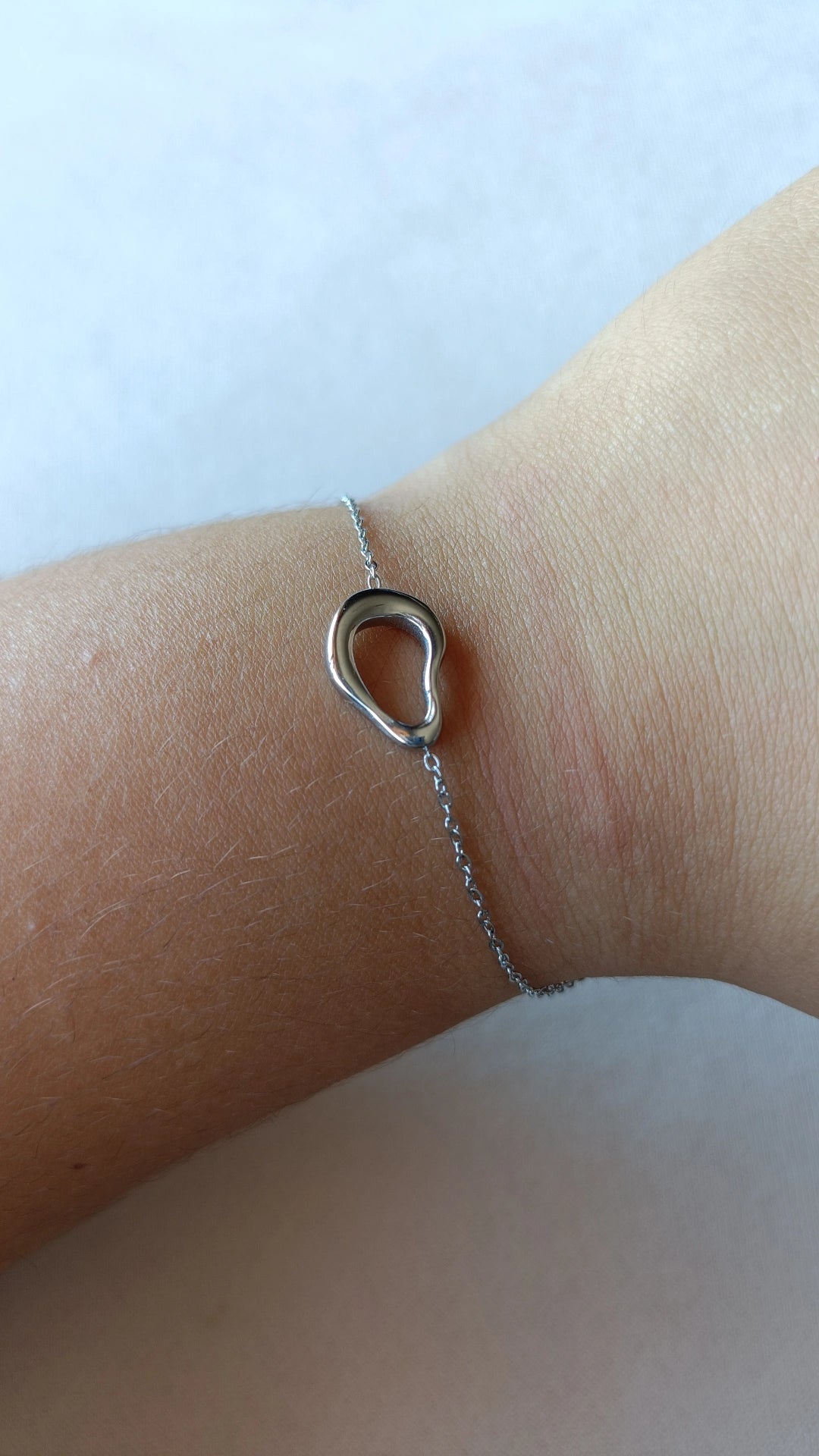 Pulseira de Aço Prateado Oval Irregular