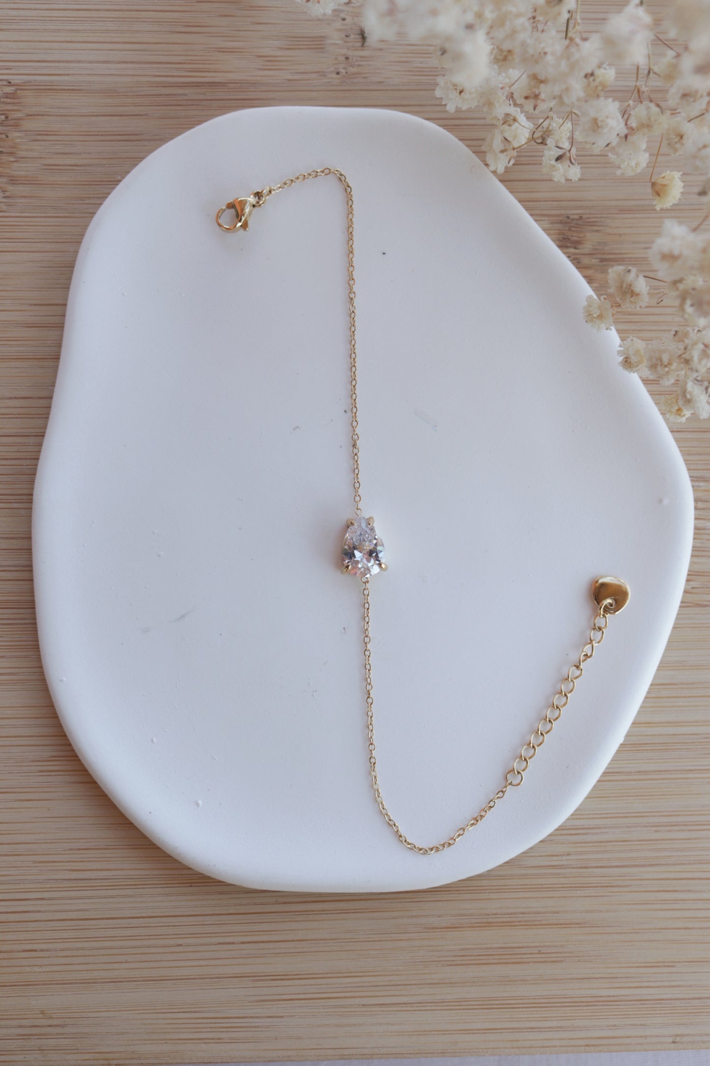 Pulseira de Aço Dourado com Zircónica Branca de Gota