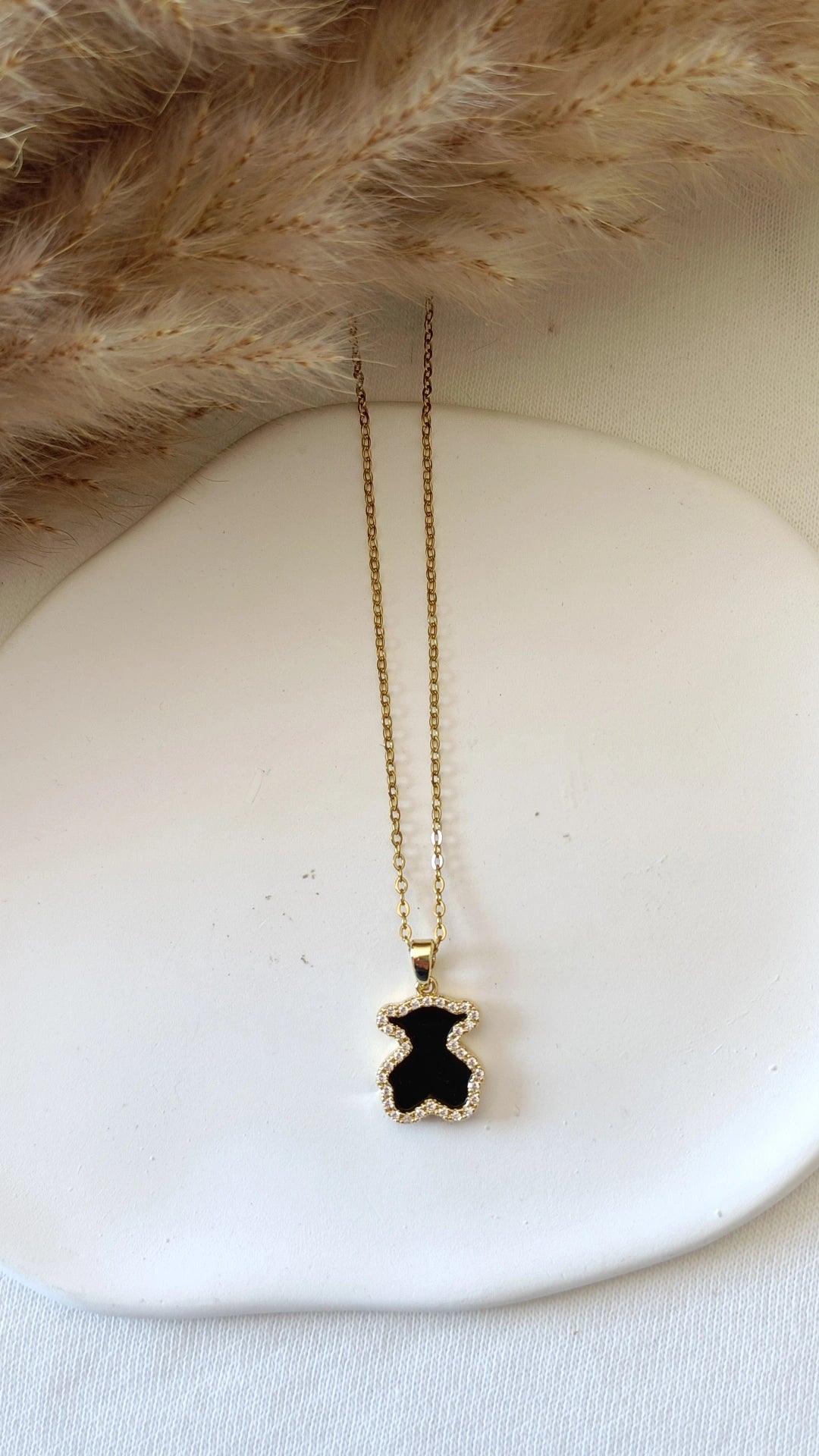 Colar de Aço Dourado de Urso Preto com Brilhantes