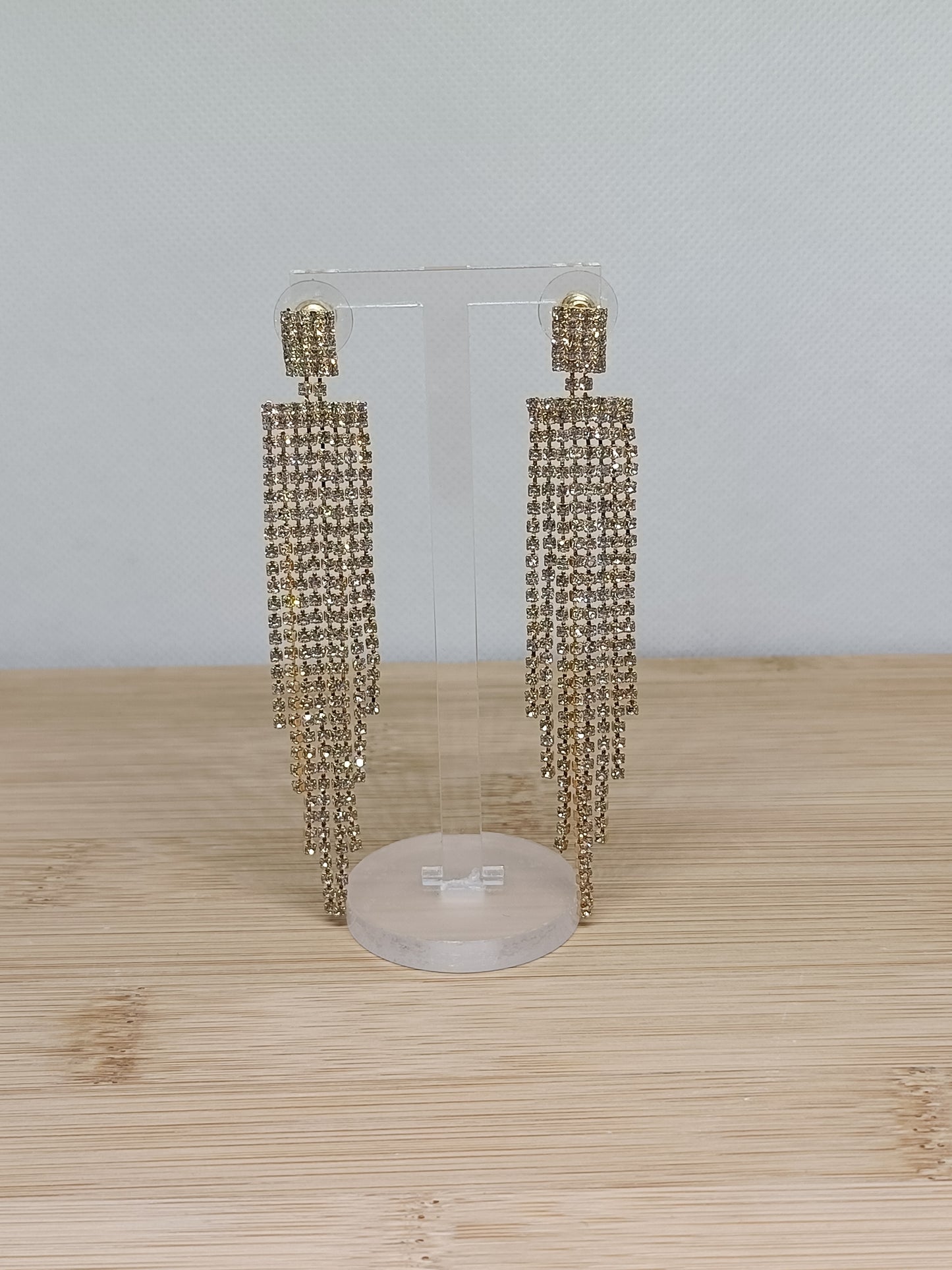 Brincos de Aço Dourado Compridos com Zircónicas