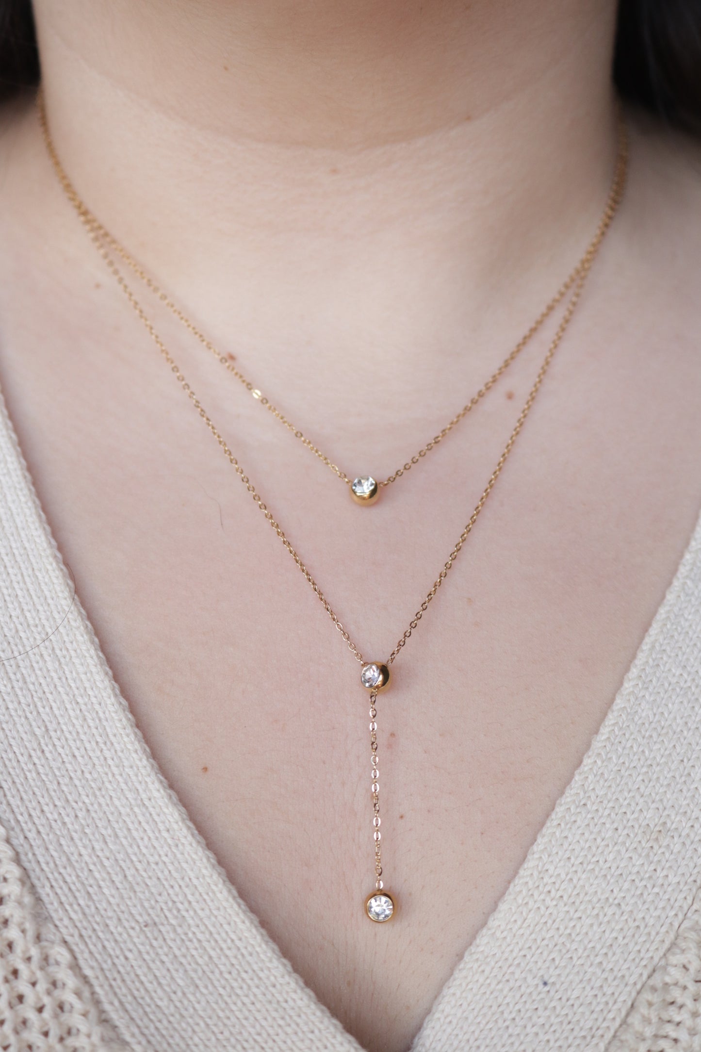 Colar de Aço Dourado Triplo com 3 Brilhantes