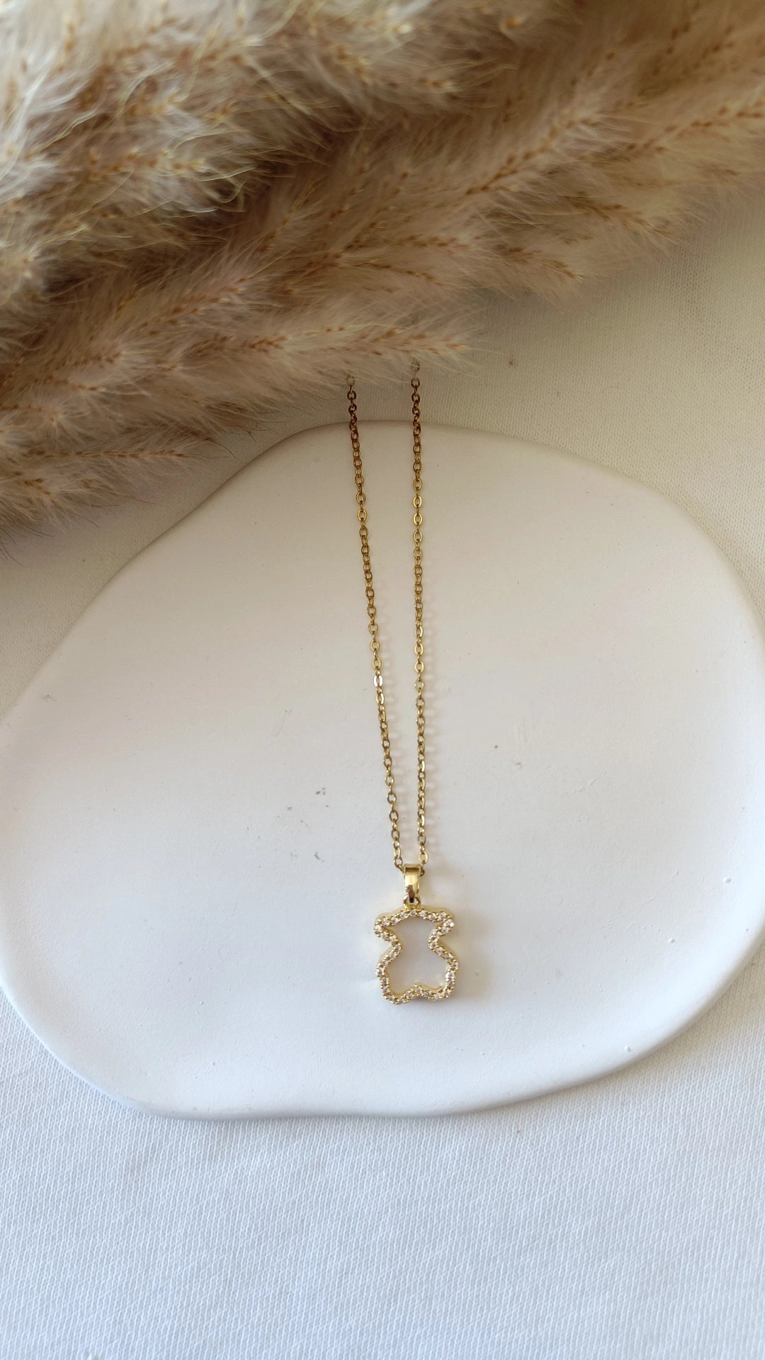 Colar de Aço Dourado de Urso Branco com Brilhantes
