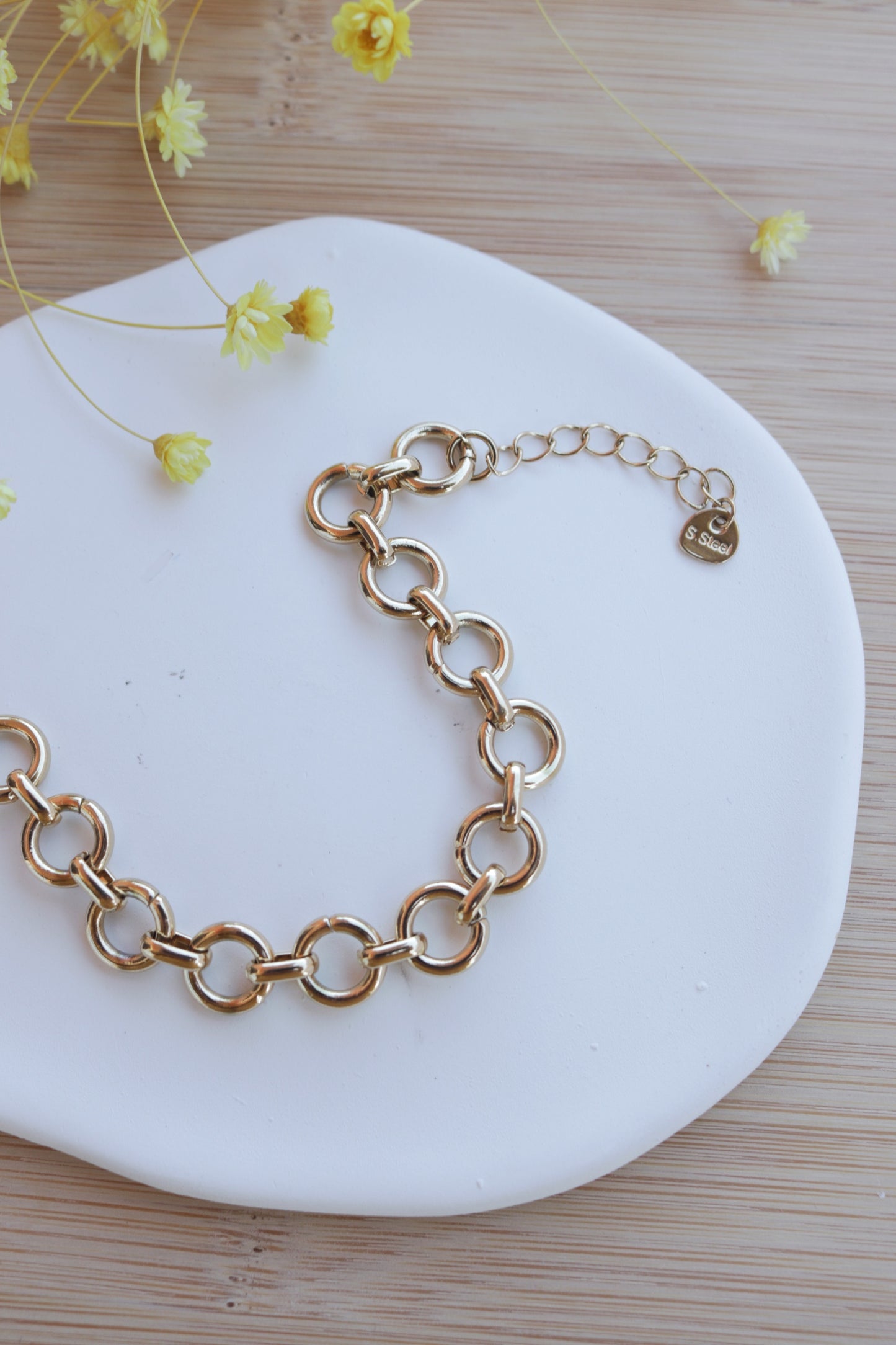 Pulseira de Aço Dourado de Elos Circulares