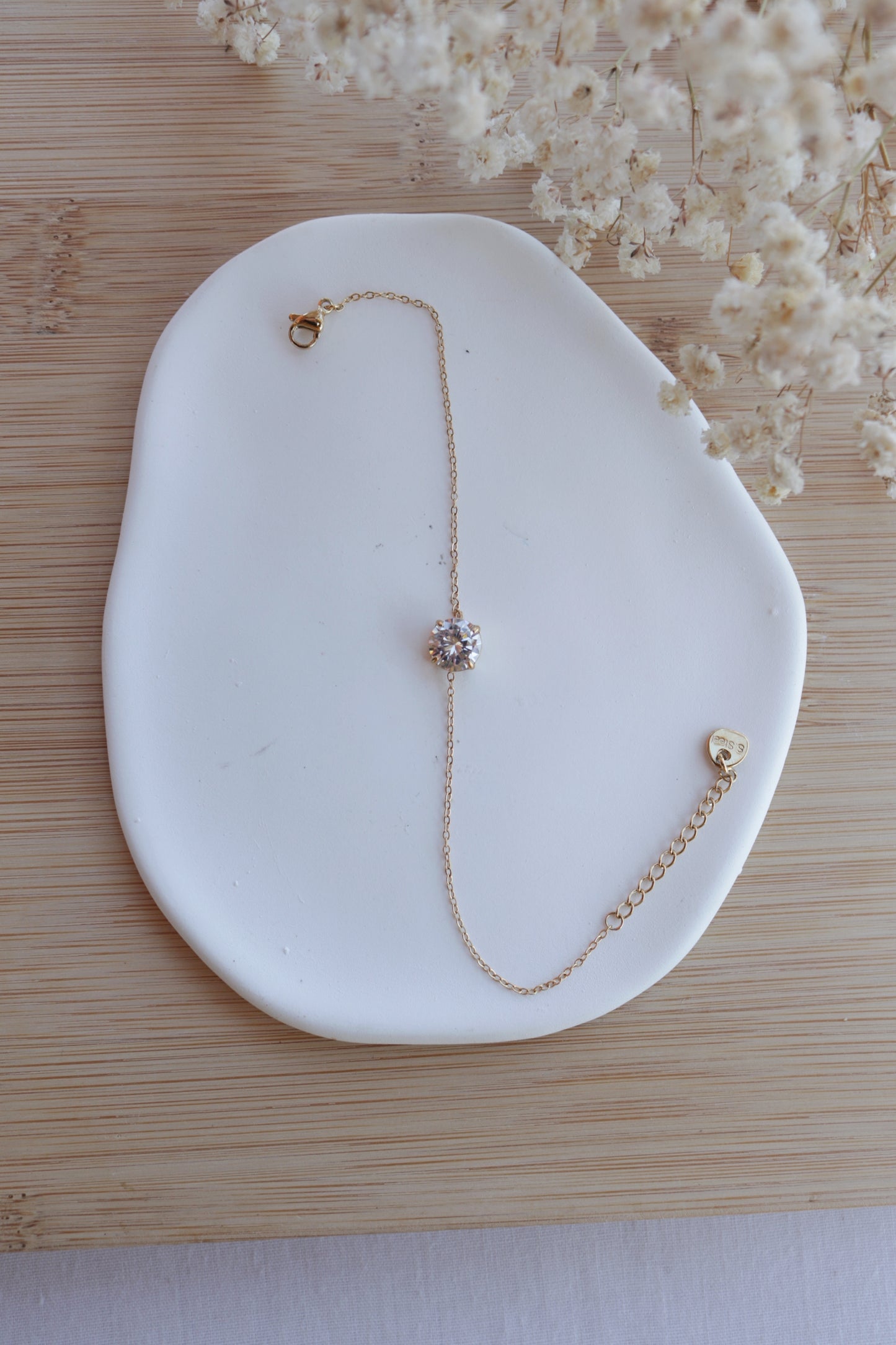 Pulseira de Aço Dourado com Zircónica Branca